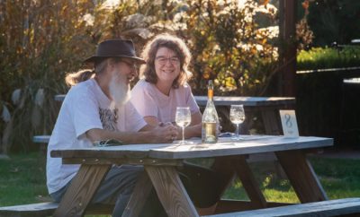 Rance and Sharon Fawbush enjoy a bottle of wine at the Owen Valley Winery outside of Spencer.