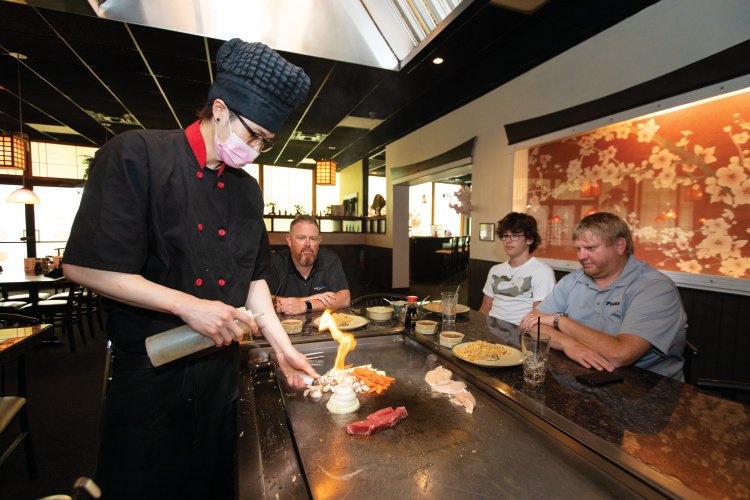 Hibachi chef June Kim cooking