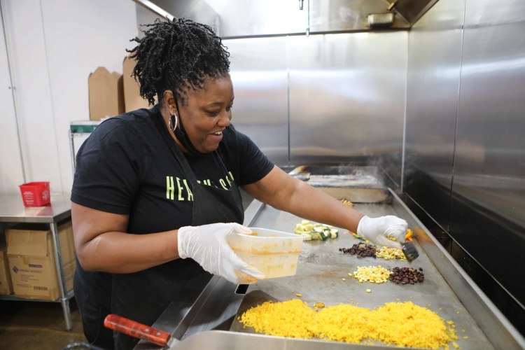 Tawana Gulley cooking in Healthy Soul's kitchen