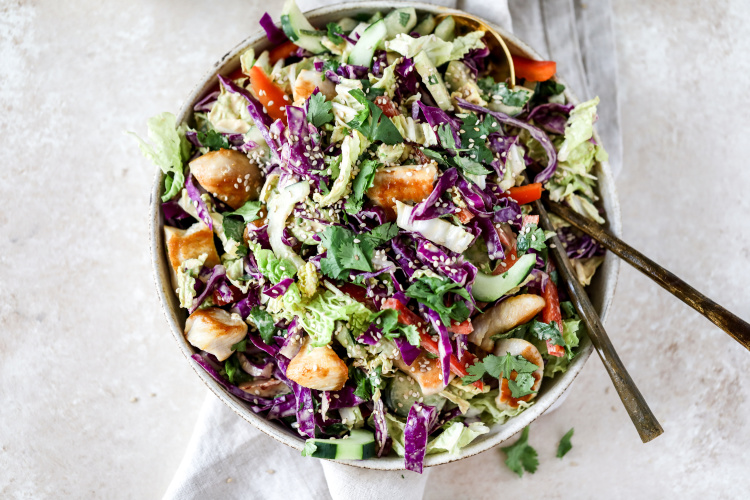 Cabbage Salad with Chicken and Thai Peanut Dressing in a bowl