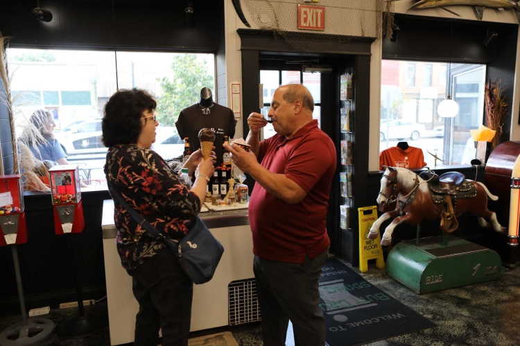 Two visitors eating ice cream at Butt Drugs