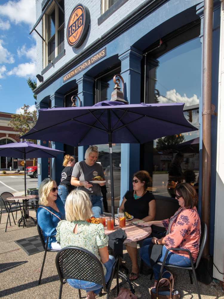Friends enjoy lunch at the 1816 Modern Kitchen and Drinks in downtown Corydon