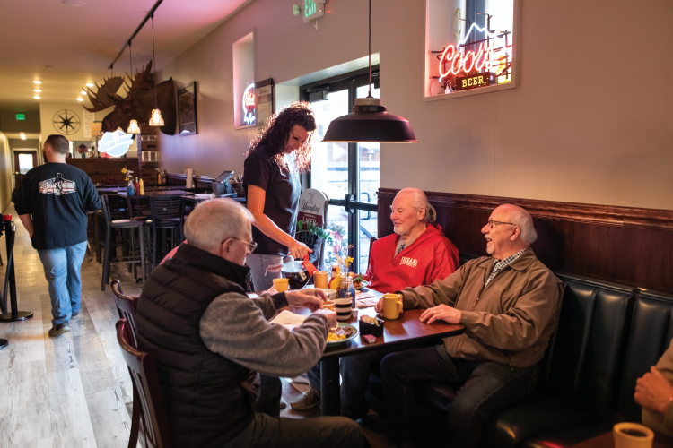 Customers eating breakfast at Glass Capital Grill