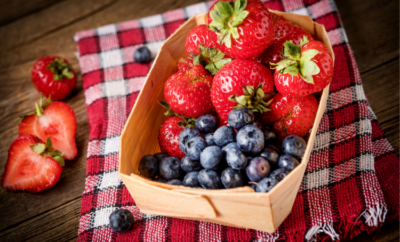 Strawberries and blueberries in a small basket