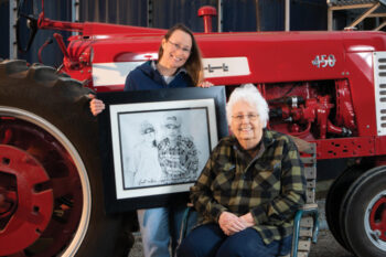 Sue Losure with her daugher Amy Beebe who is holding a photo of her dad