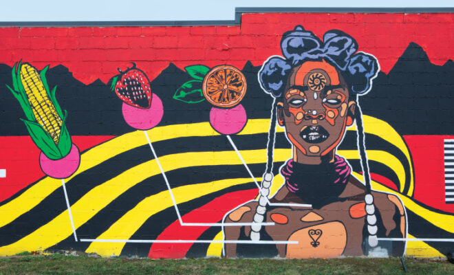 Mural on the side of Cleo's Bodega