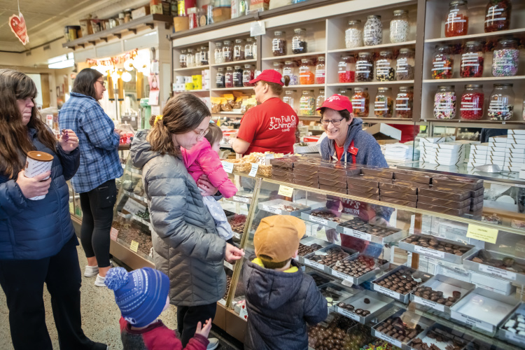 Customers purchasing candy at Schimpff’s Confectionery
