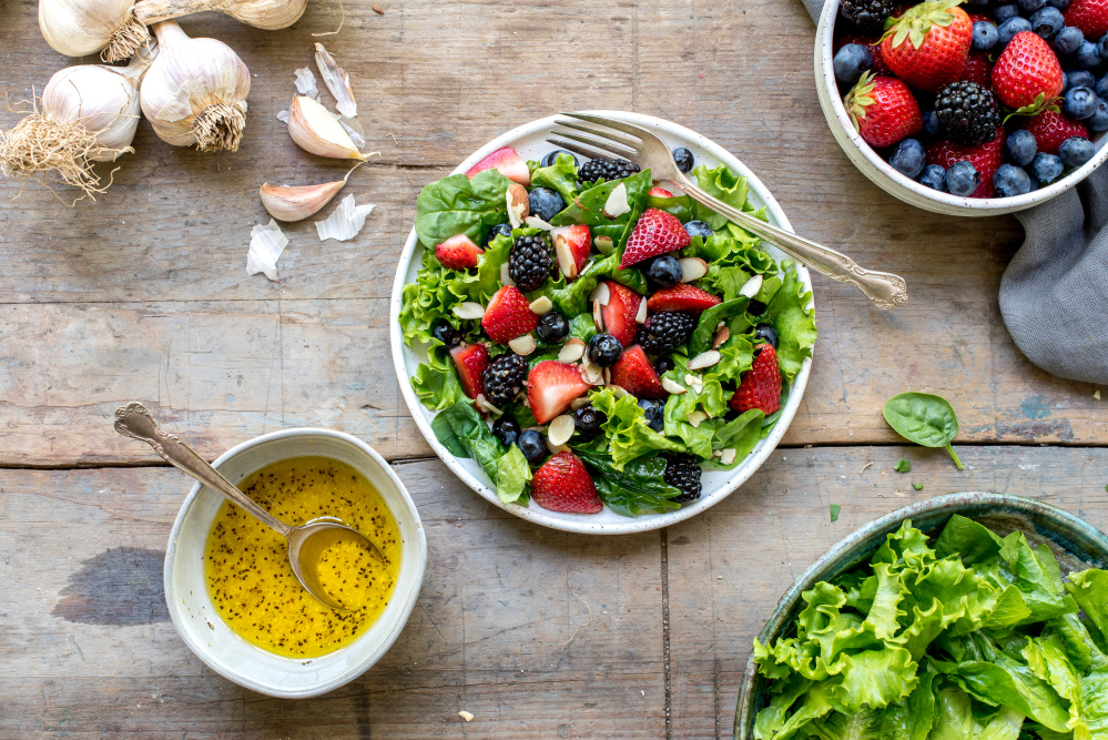Spring Greens Mixed Berry Salad with Garlic Vinaigrette