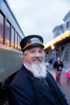 A conductor greets visitors for the French Lick Scenic Railway's Polar Express