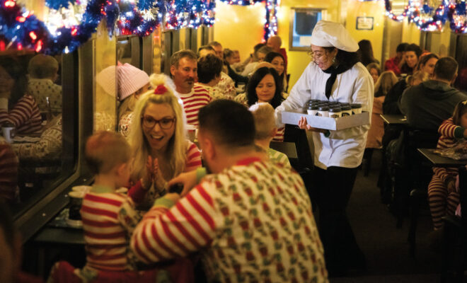Actors dressed as chefs pass out hot chocolate and cookies on the French Lick Scenic Railway's Polar Express