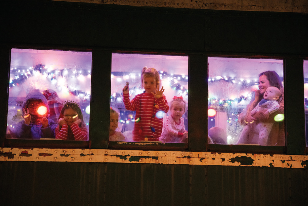 Passengers looking out the train window