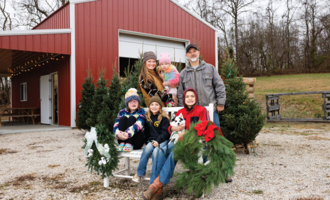 Scott and Ashley Ratkovick holding their daughter, Nellie, with their children Paisley, Nash and Brink