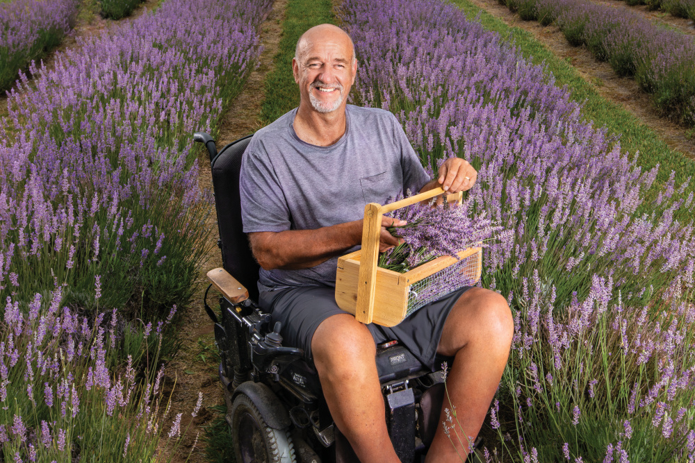 Rich Borkholder in his lavender U-pick field at Aroma Acres