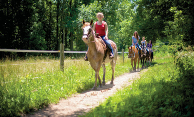 Riders on a trail at the Natural Valley Ranch in Hendricks County