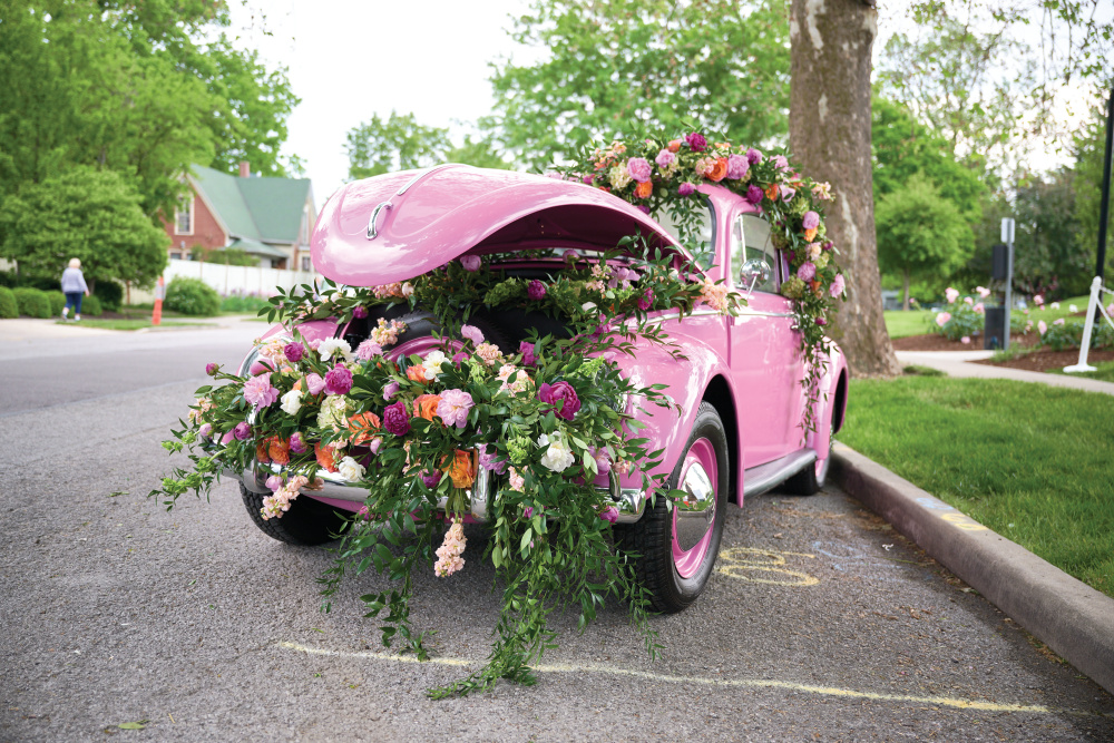 Pink antique VW bug decorated with peonies