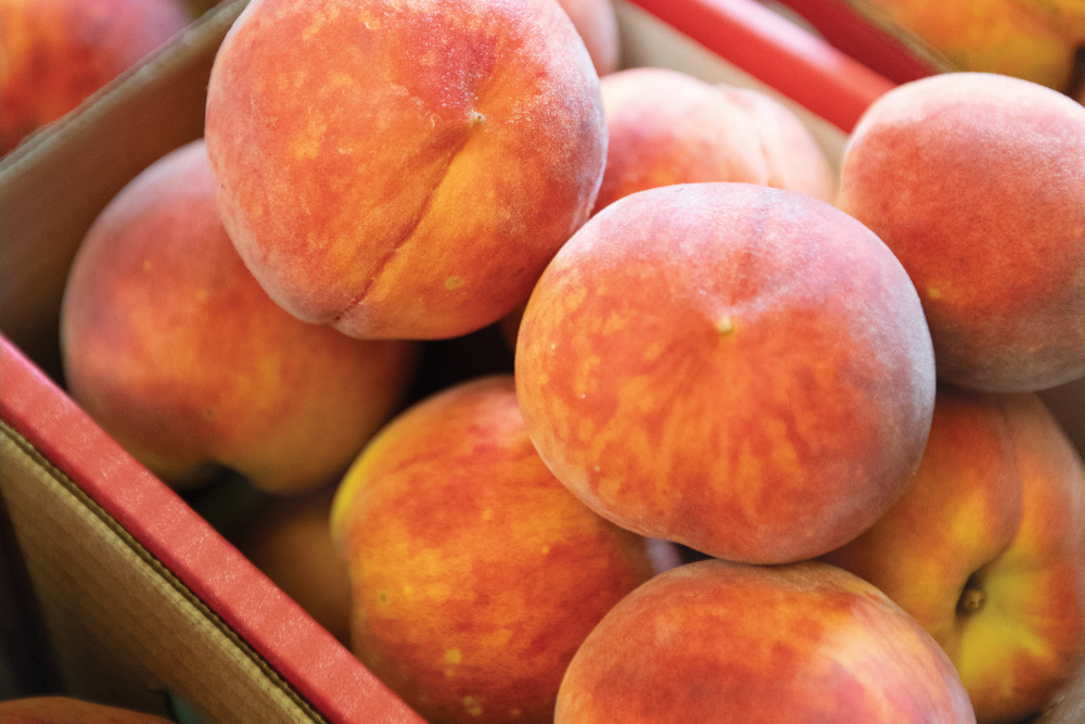 Annie's Orchard peaches in boxes