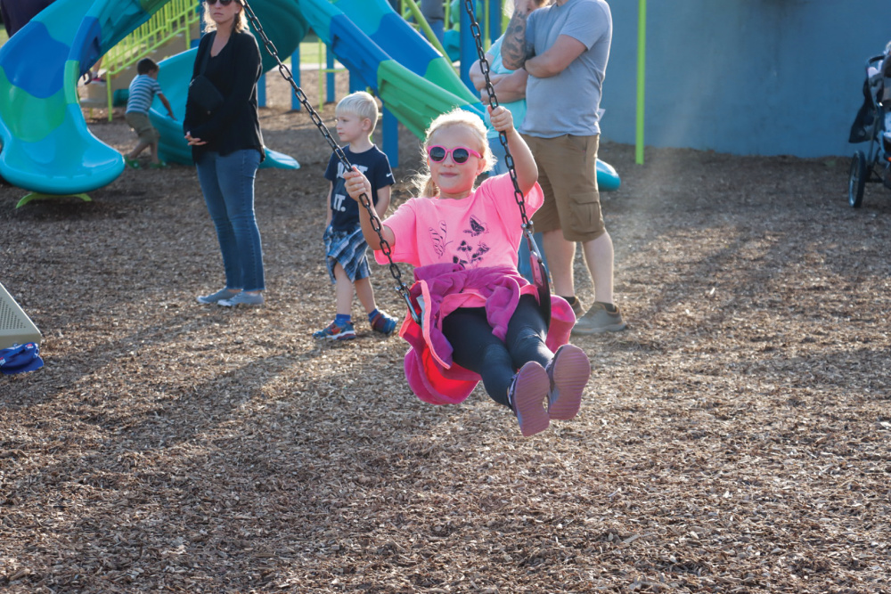 Girl swinging at Lake County Parks