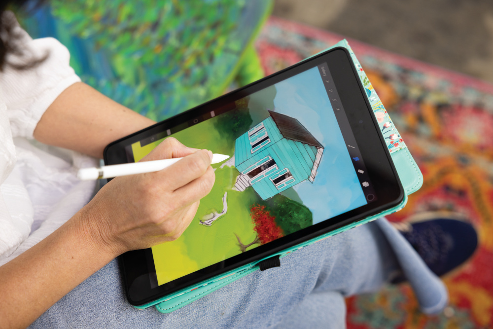 Elisa Barety sketching on a tablet