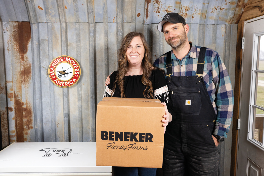 Allen and Jayme Beneker pack boxes with beef products at Beneker Family Farms