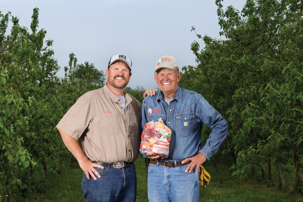 Matt and Jerry pose for a photo at Chandler's Orchard and Country Market