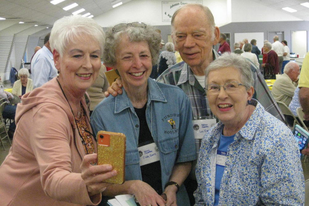 A group takes a selfie at the Indiana Rural Youth/Young Adults Reunion